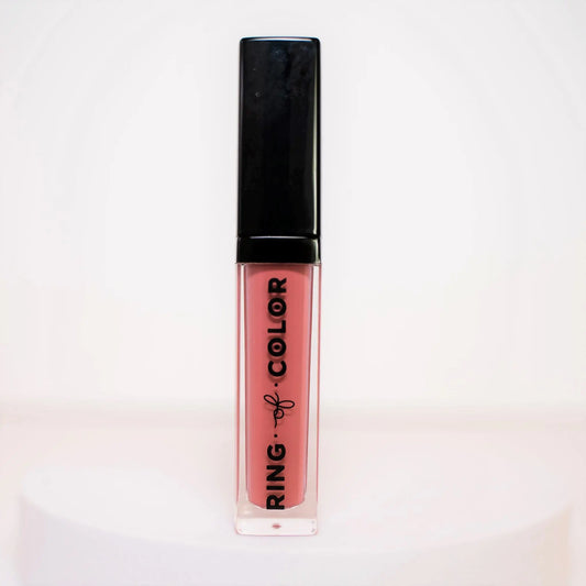 Lipstick with black cap and pink body on a white background