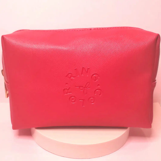 Red pouch with 'Ring of Color' branding on a pink background