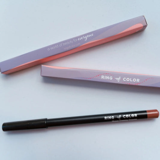 Lip liner with packaging on a light blue background