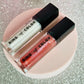 sheer lip gloss in shades red and clear