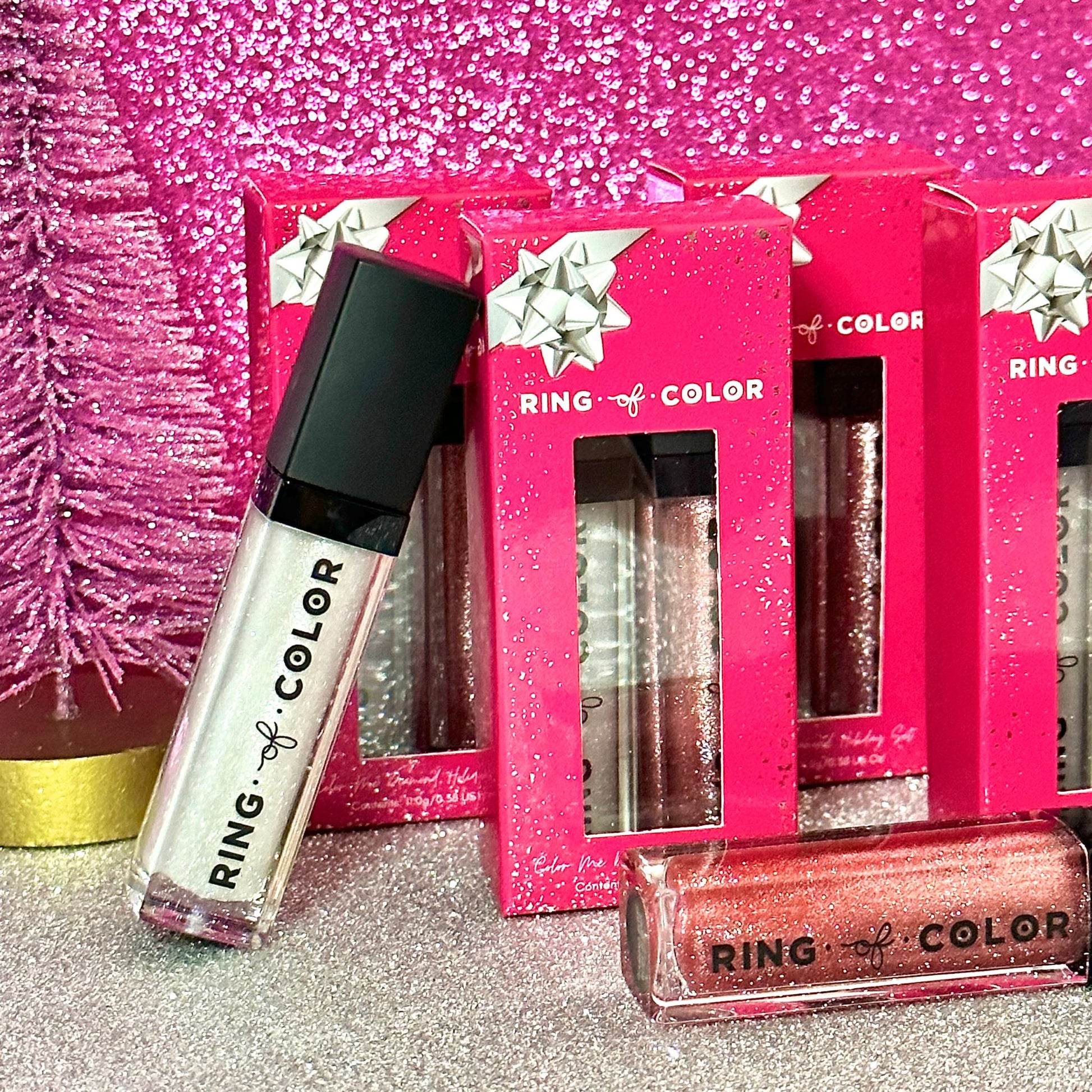 diamond sheer gloss and ruby red sheer gloss in a pink holiday box with a silver bow