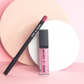 pink lip gloss and berry liner standing against each other with two circle props behind them