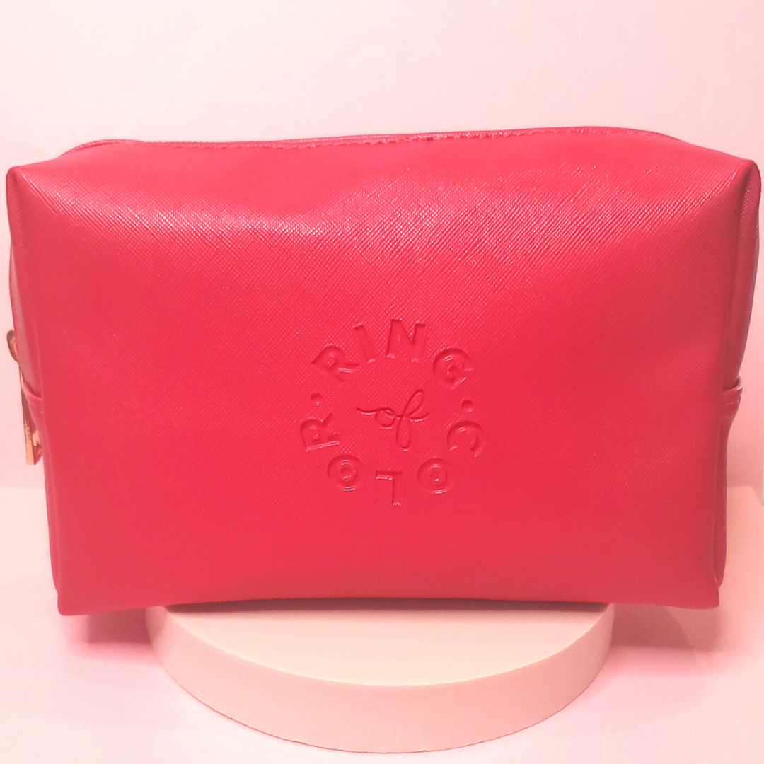 travel size rectangular makeup bag color dark pink with ring of color logo